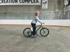 Young girl on bike at the Recreation Complex.