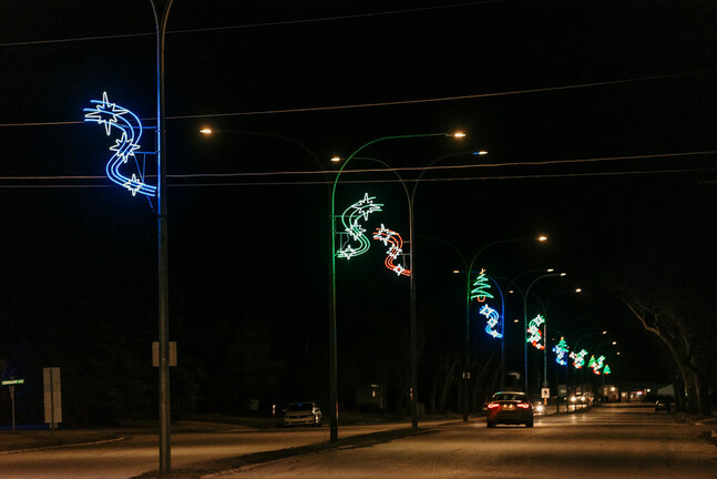 Christmas decorations on main street light posts.