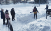 Residents working together to shovel snow.